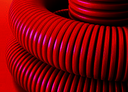 DKC Труба гибкая двустенная для кабельной канализации д.75мм, цвет красный, в бухте 72м., с протяжкой